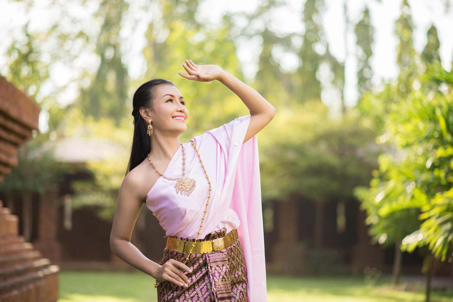 Beautiful Woman wearing typical Thai dress photo