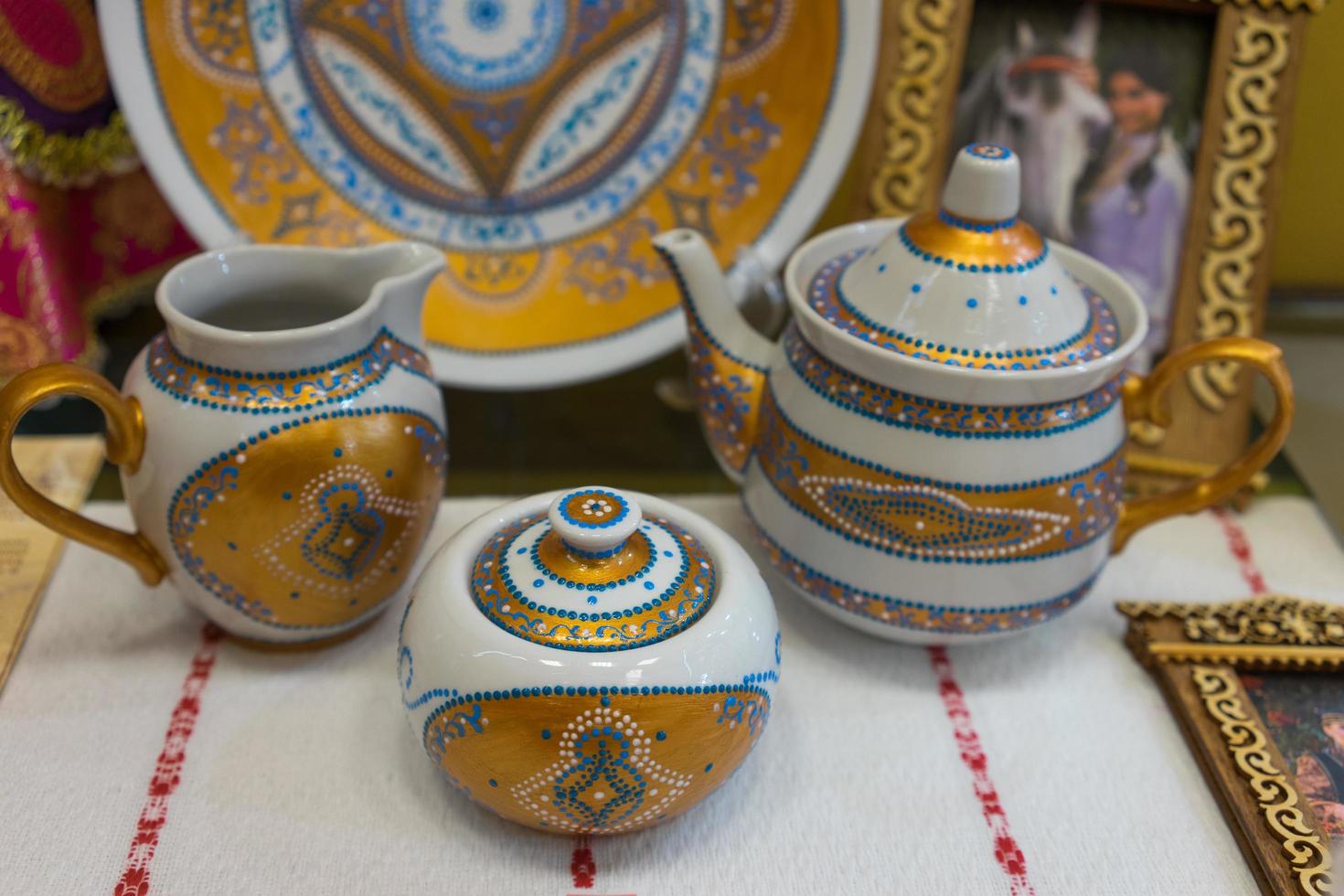 Sochi, Russia-September 24, 2017-Hand-painted porcelain tableware. photo