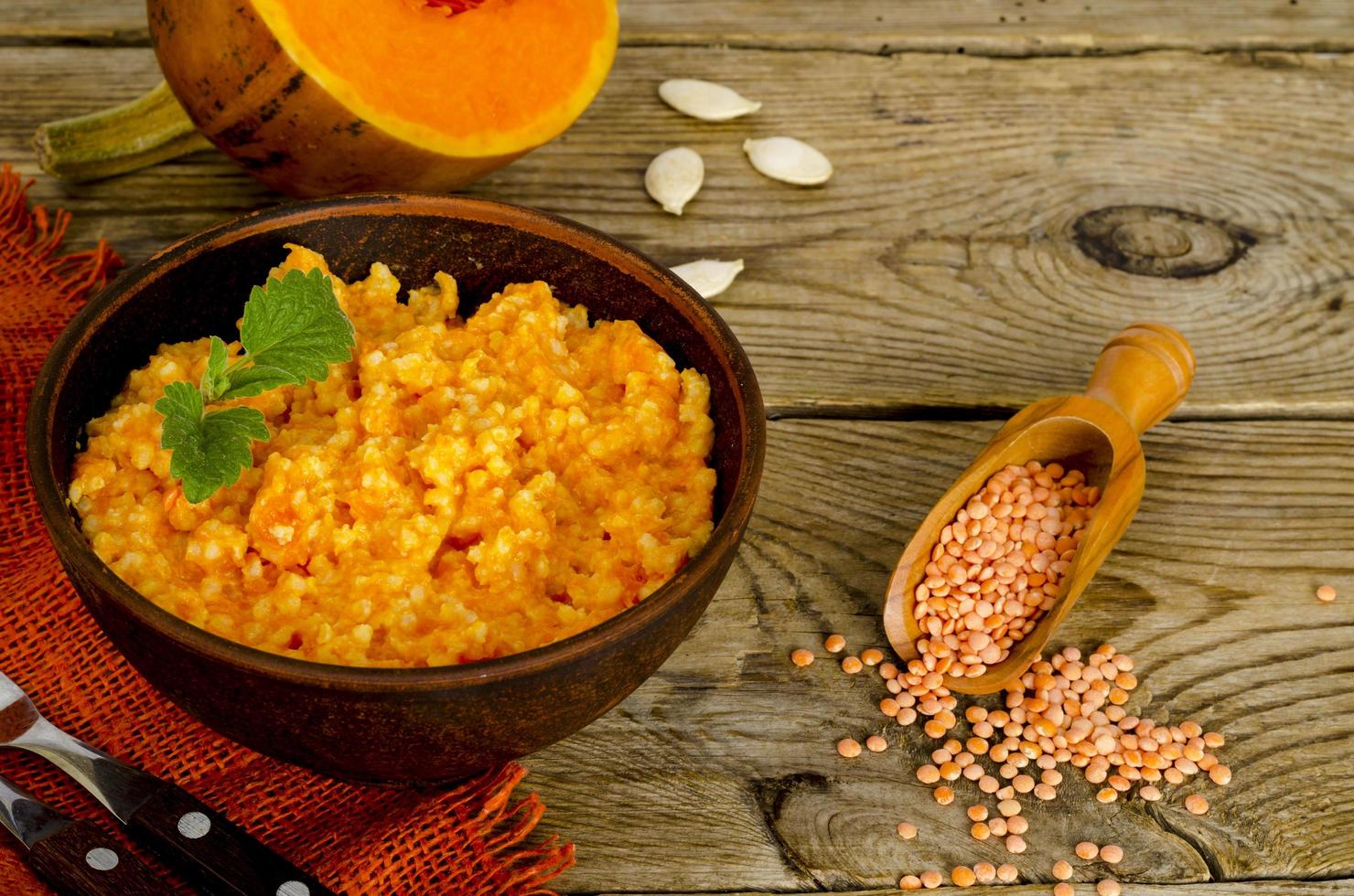 Vegetarian food, porridge with pumpkin and lentils. photo