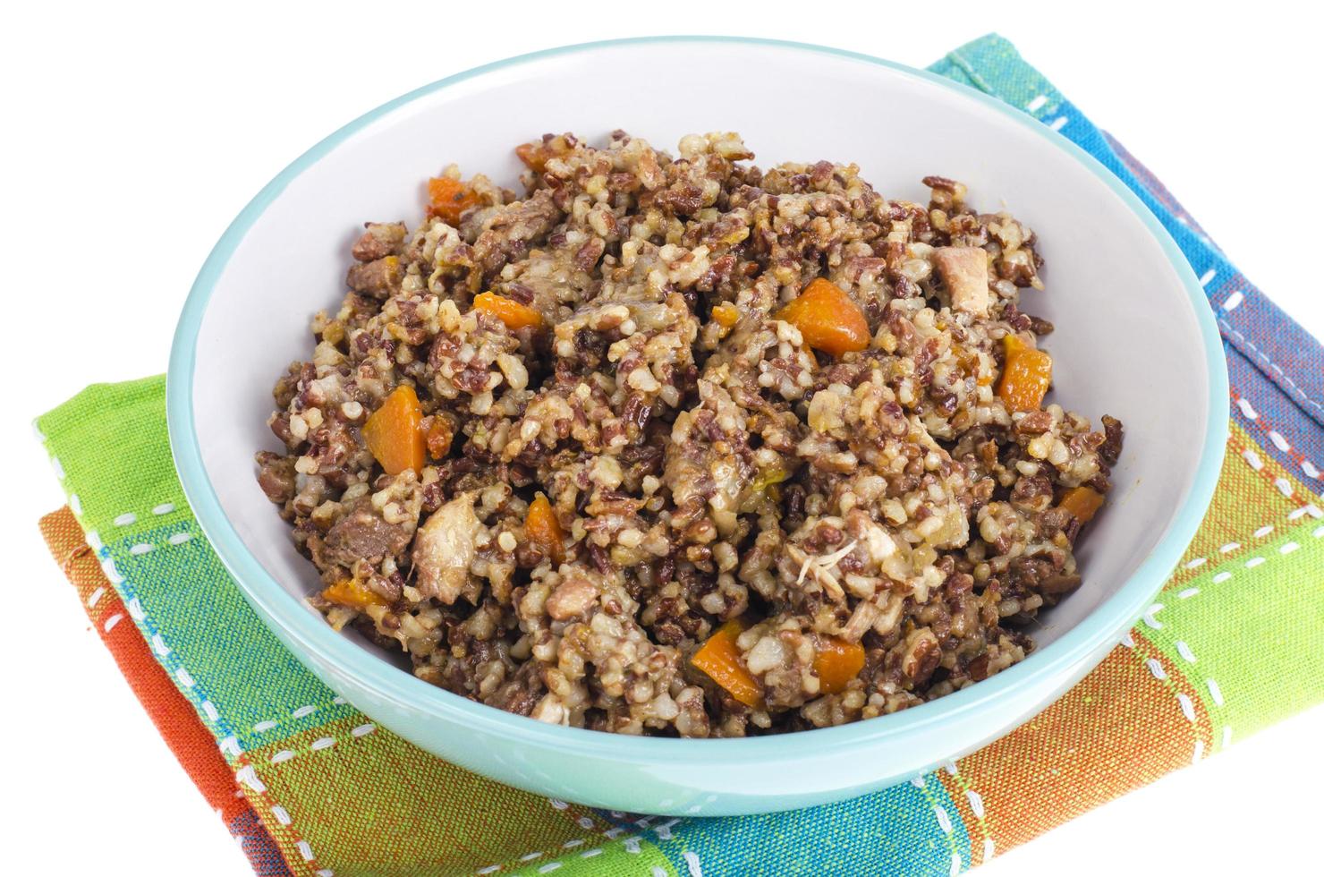 Red rice porridge with meat and vegetables. photo