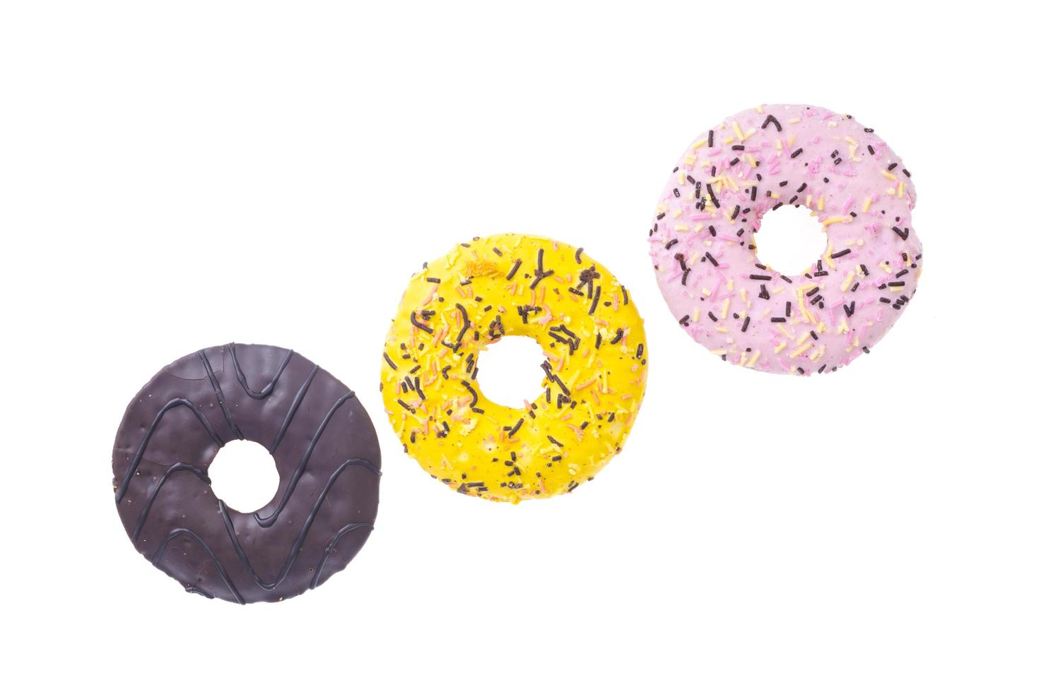 Sweet tasty donuts with colorful icing. photo