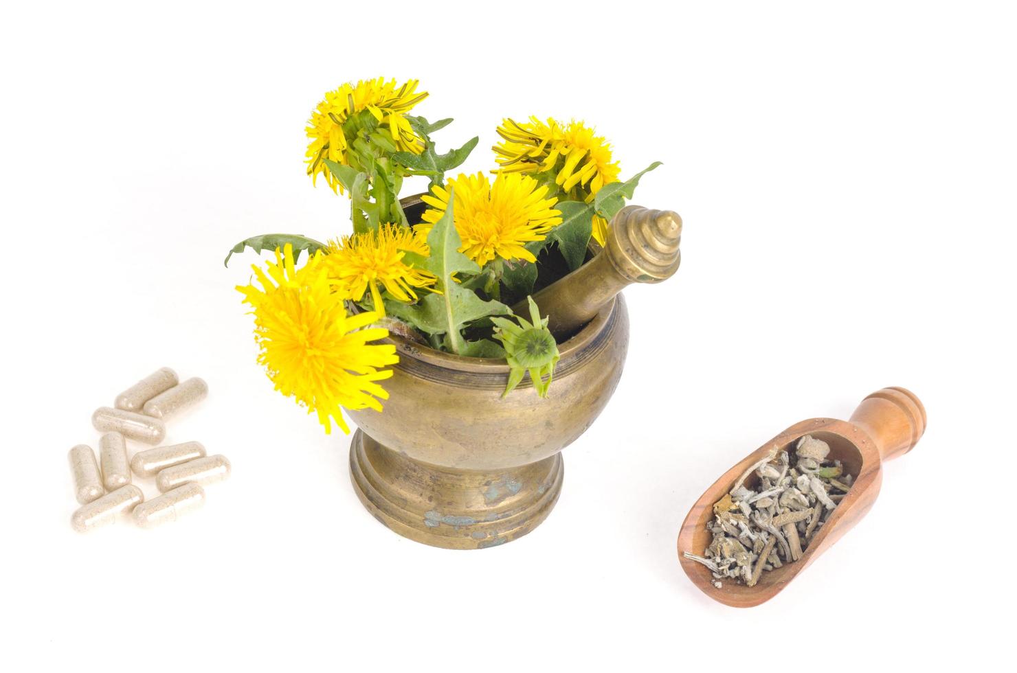Herbals in mortar and modern medicines, herbal medicine in capsules. photo