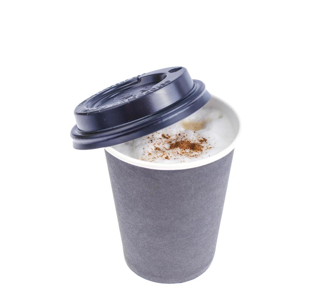 Disposable black paper cup with cappuccino, latte. 5432005 Stock