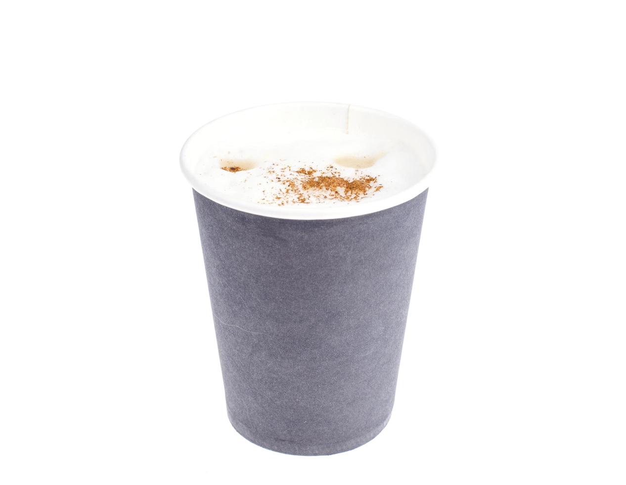 Disposable black paper cup with cappuccino, latte. photo