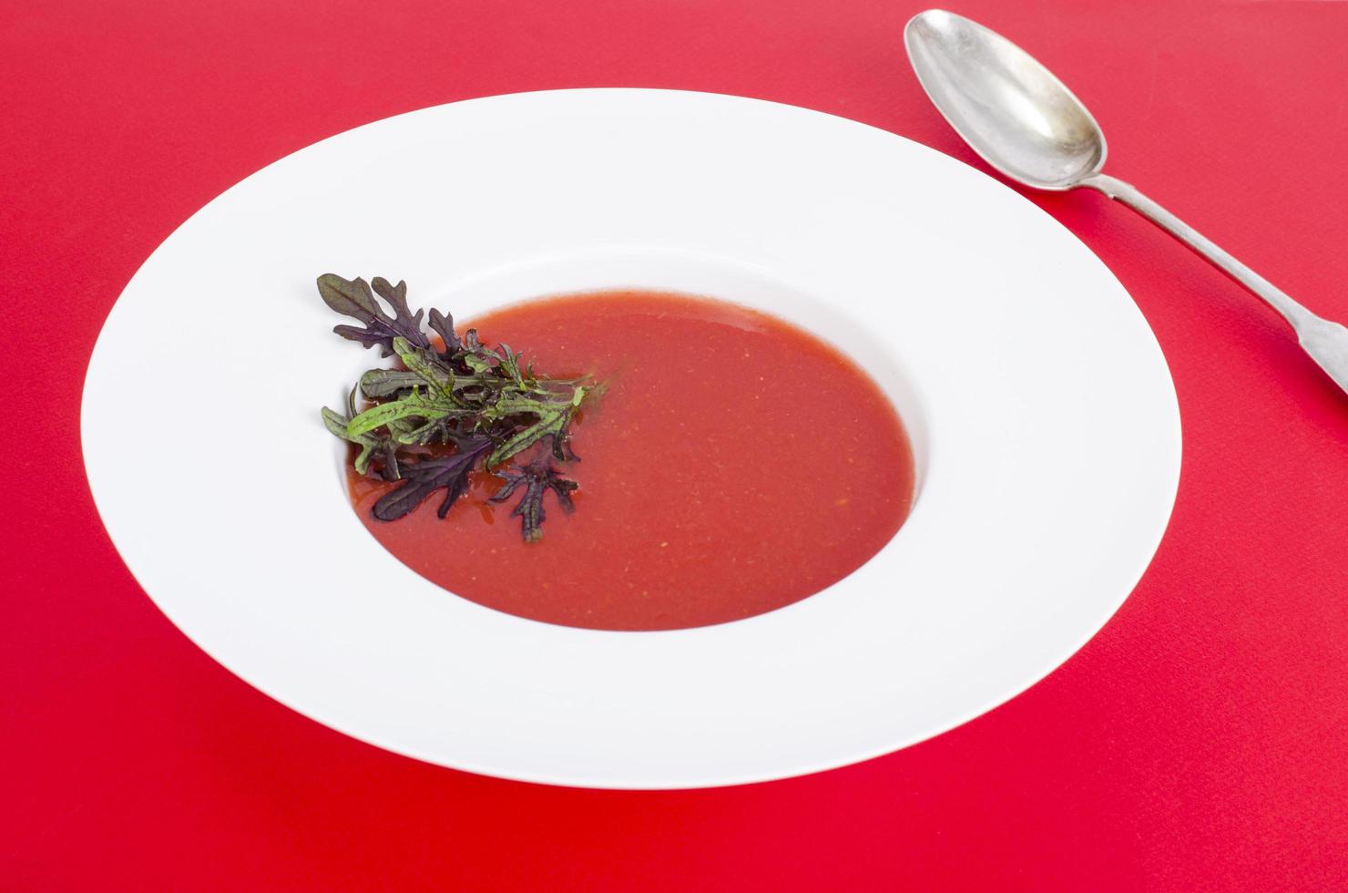 Tomato soup with microgreens.  Photo