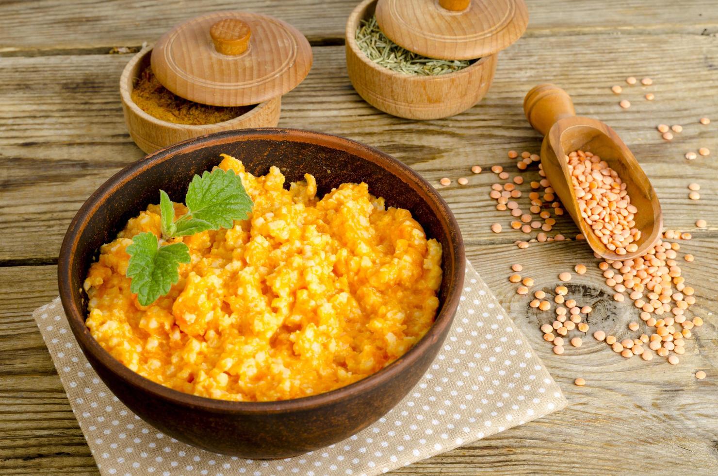 Vegetarian food, porridge with pumpkin and lentils. photo