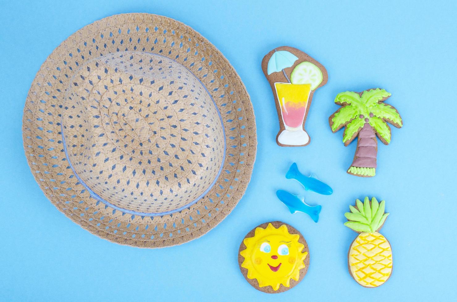 Homemade cookies with summer theme on blue background. photo