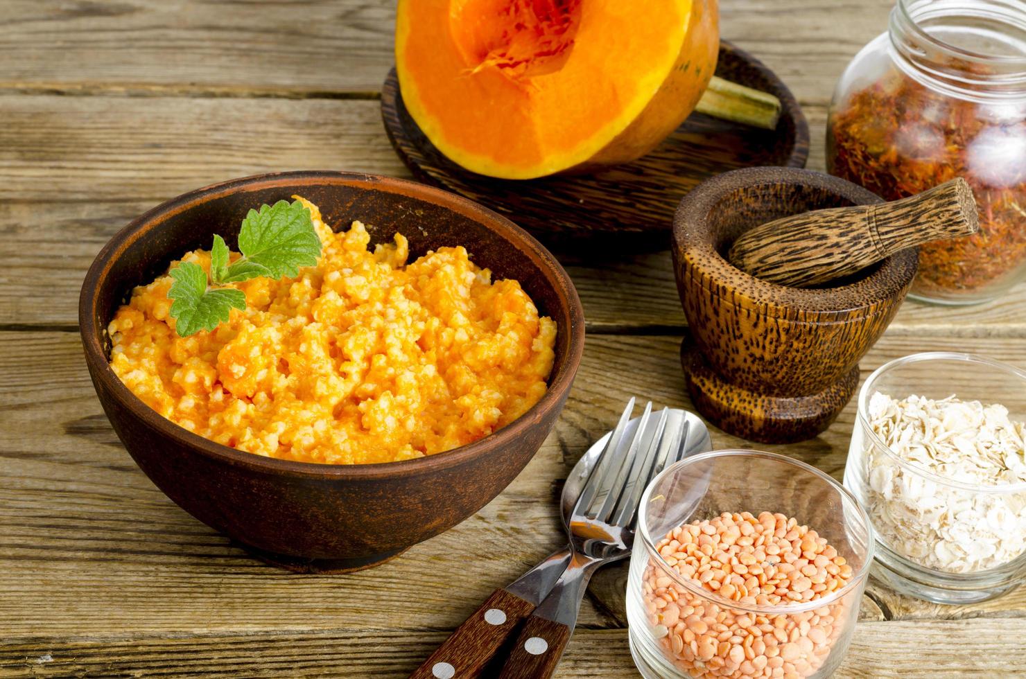 Vegetarian food, porridge with pumpkin and lentils. photo