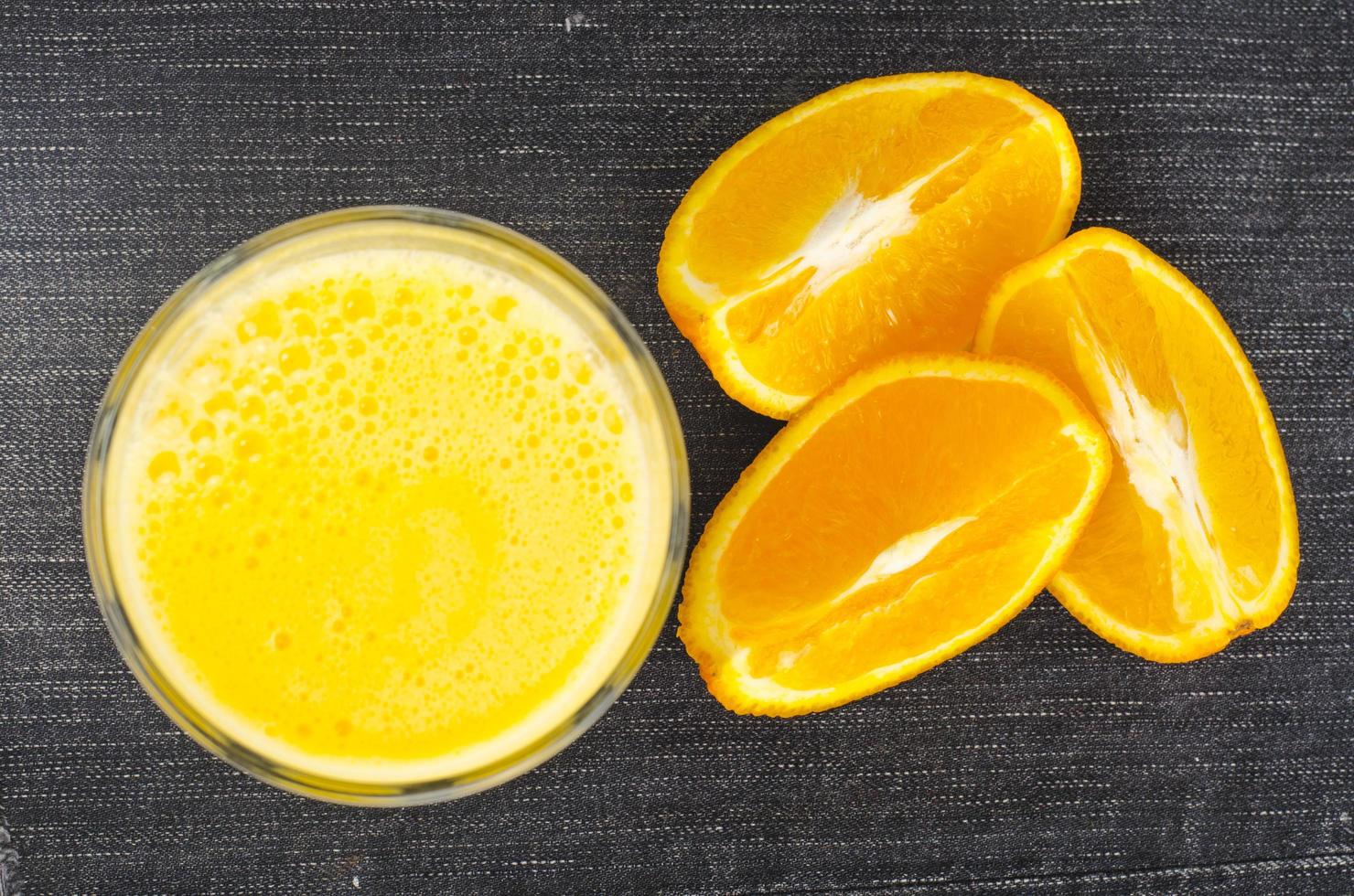 Fresh orange juice with pulp, healthy food. photo