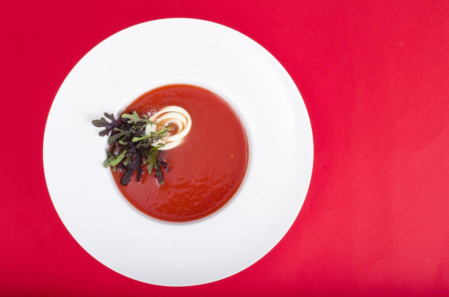 Tomato soup with microgreens.  Photo