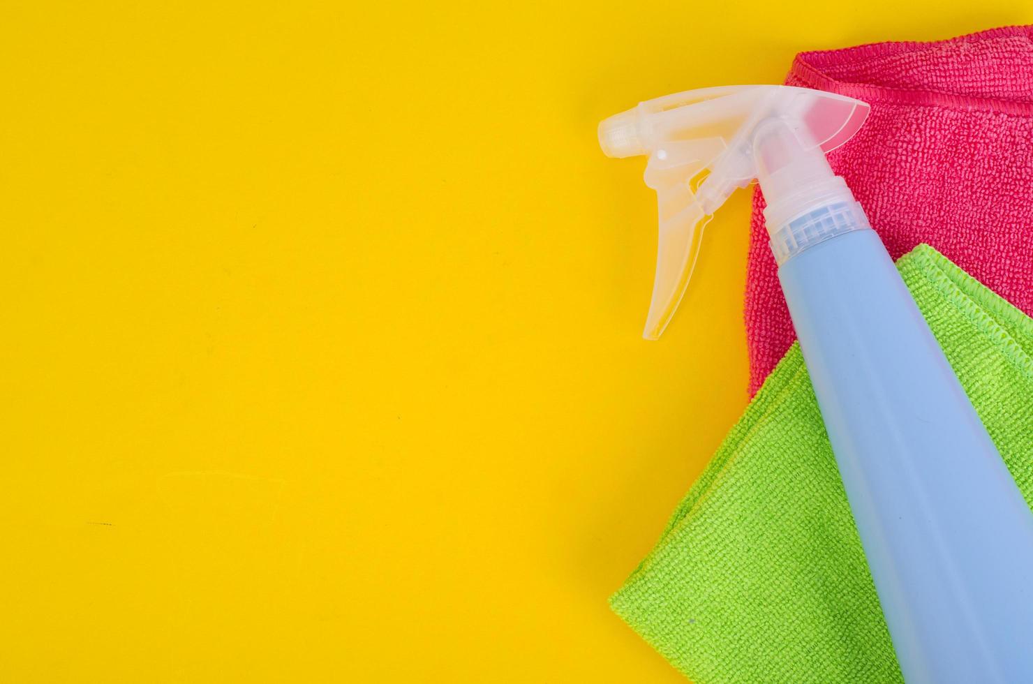 Blue bottle spray on bright background photo