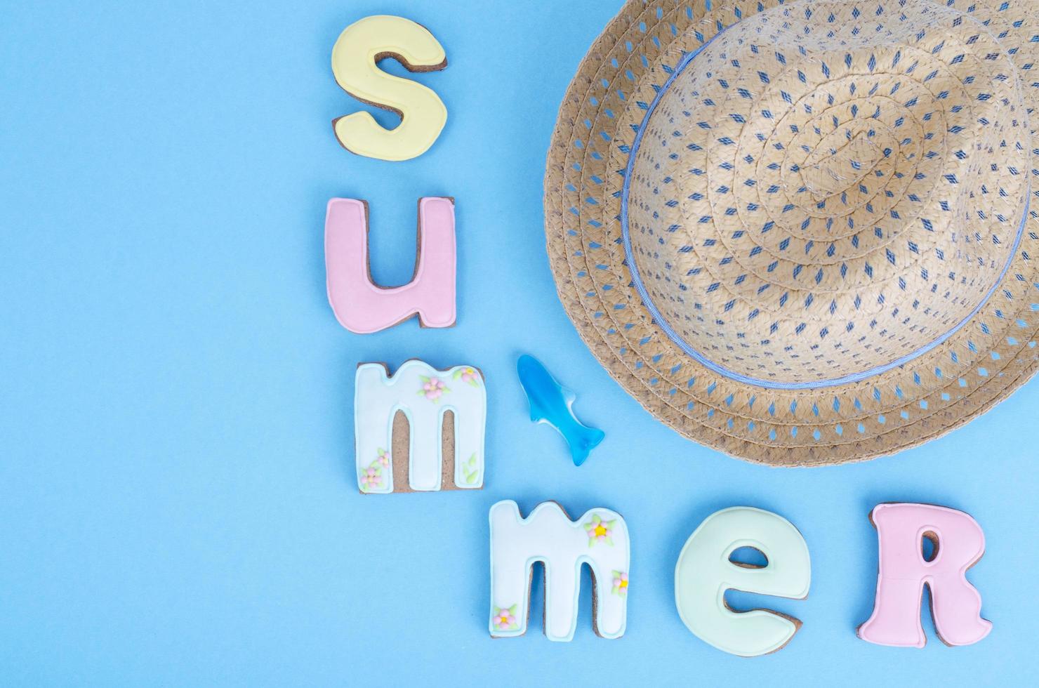 Homemade cookies with summer theme on blue background. photo