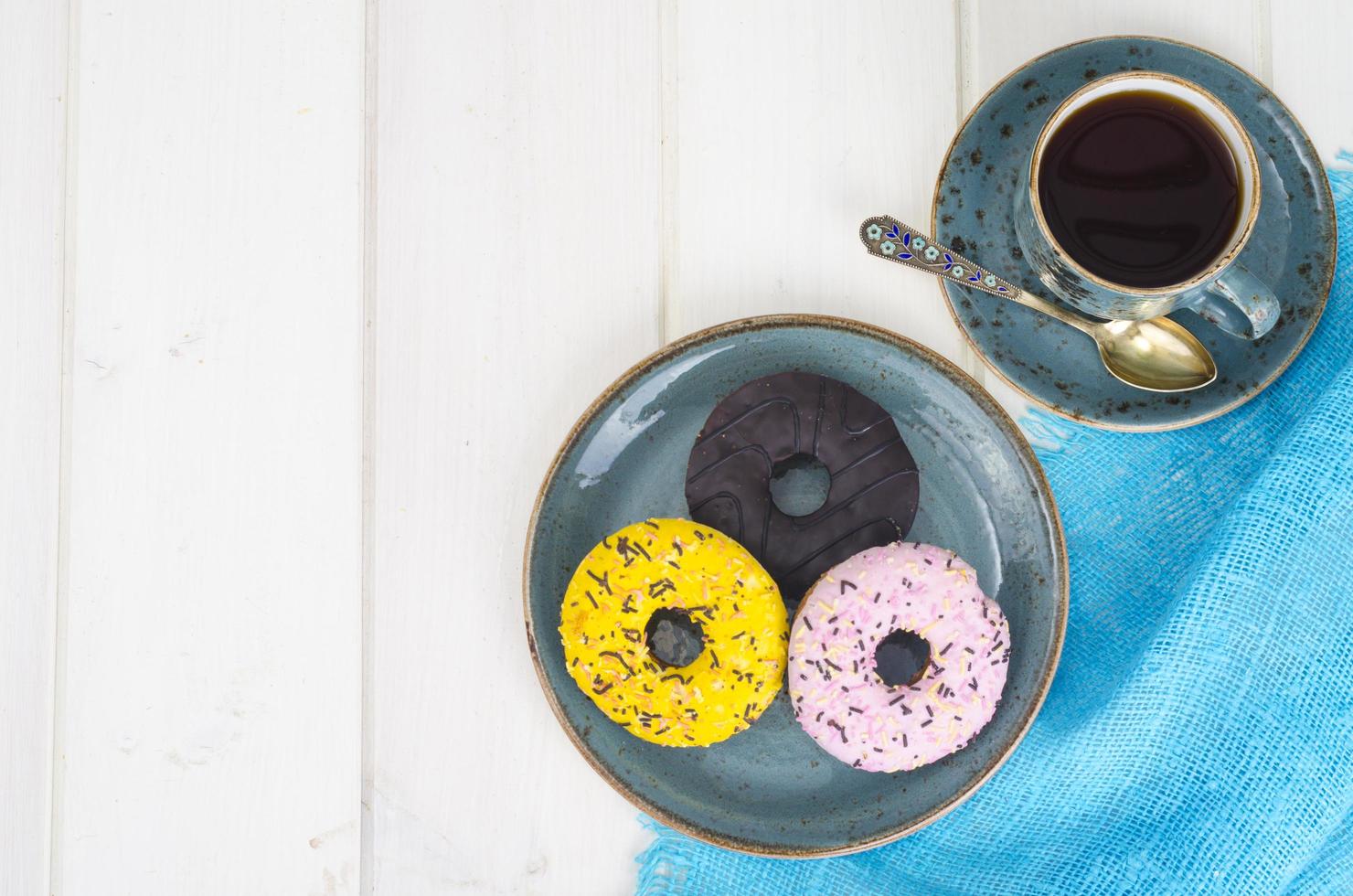 Fresh donuts, hot tea for lunch. photo
