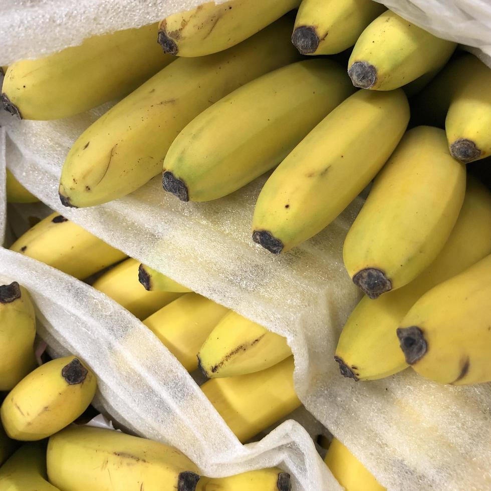 Macro photo bananas. Stock photo yellow tropical fruit banan background