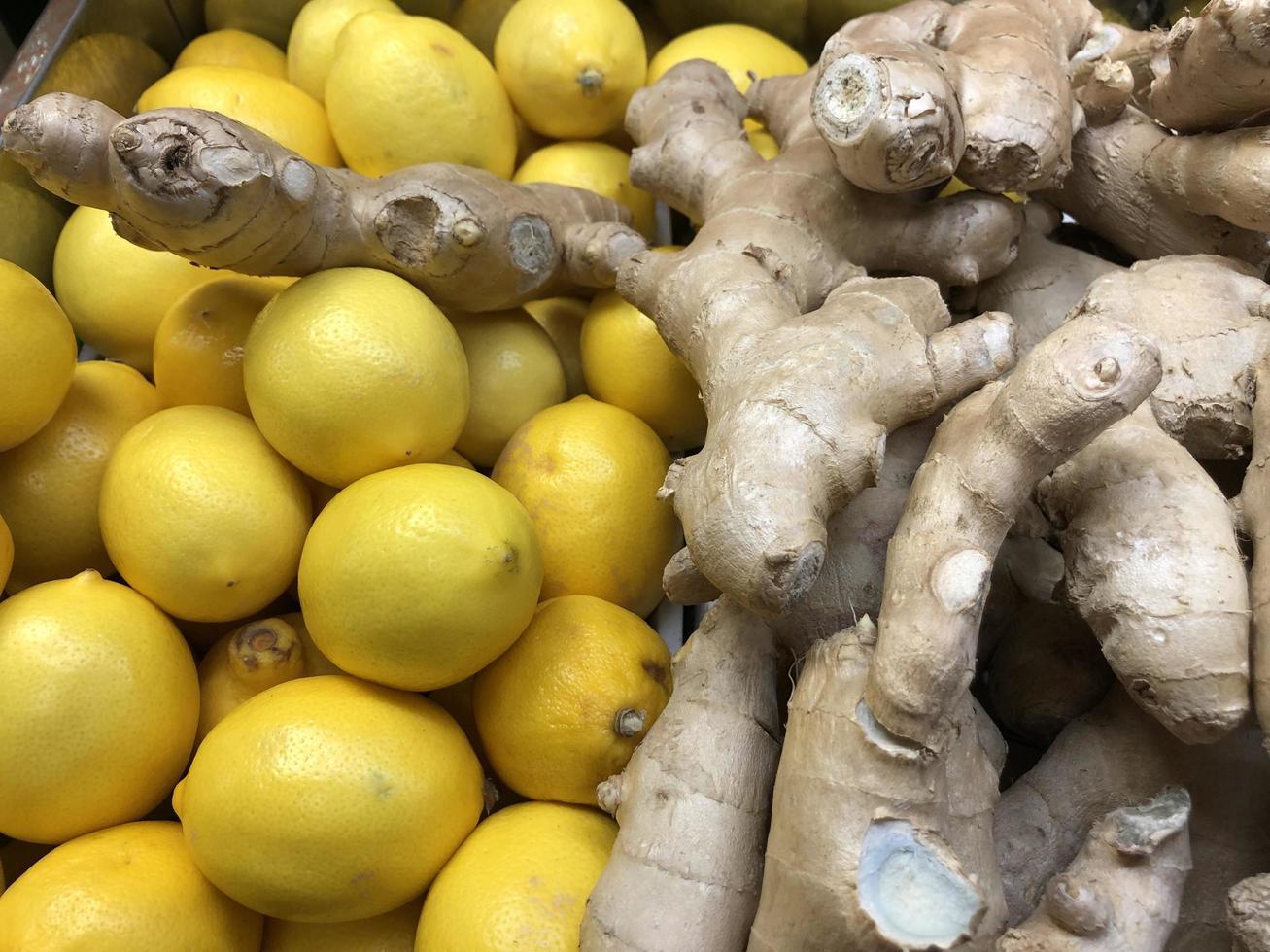 Macro photo lemon and ginger. Stock photo fruits lemons and ginger background