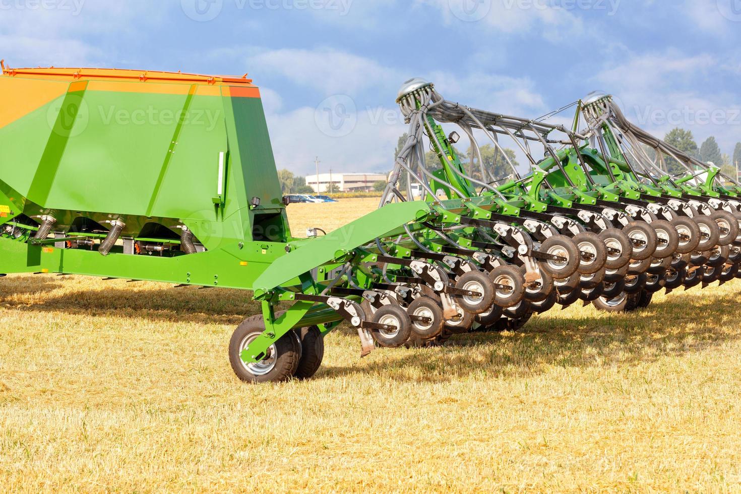 Modified agricultural cultivator and device for soil fertilization and optimal conditioning of the root zone in an agricultural field. Copy space. photo