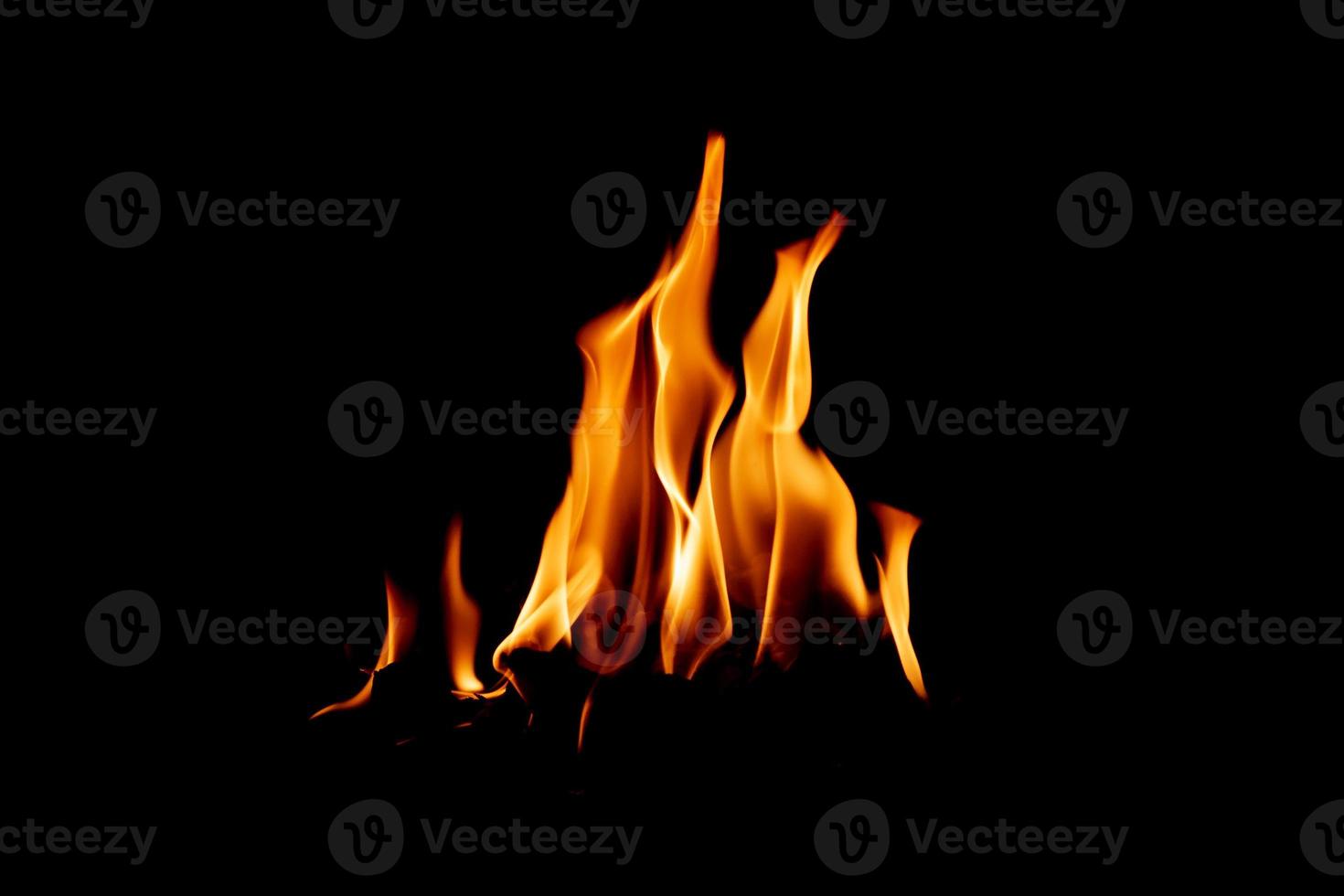 Fire flame texture. Burning material backdrop. Burn effect pattern. Blaze and torch wallpaper. Heat and haze backdrop. photo