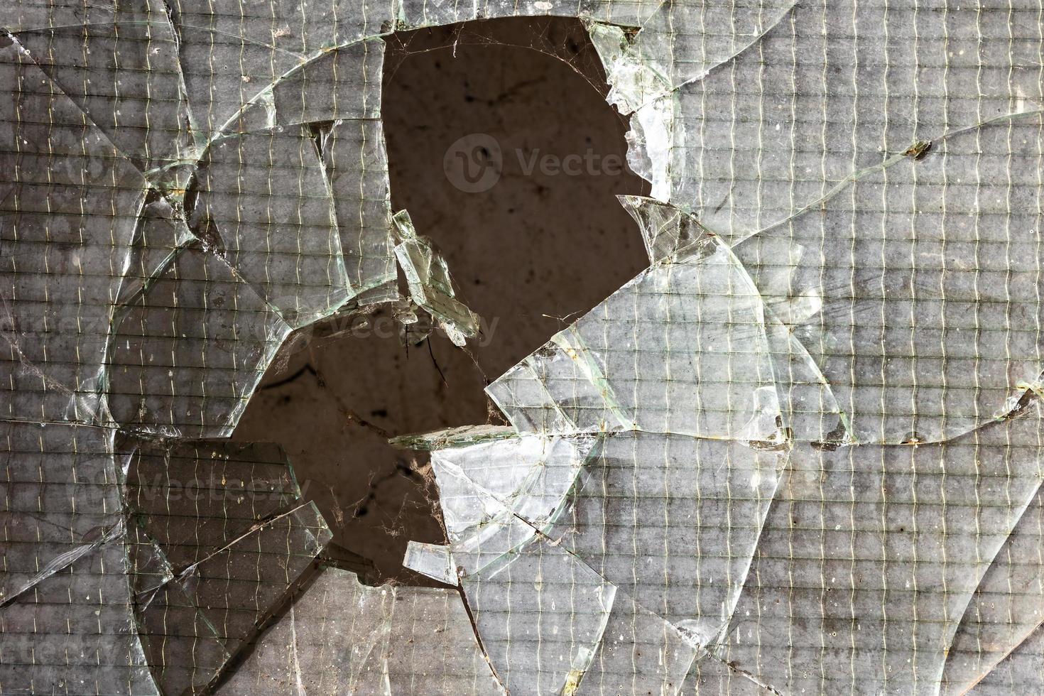 Cracked and abstract glass texture. Transparent material backdrop. Glass effect pattern. Mirror and glass background. photo