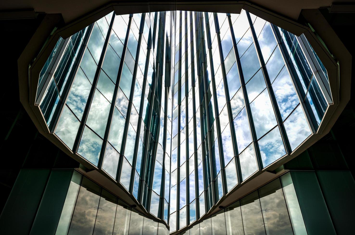 Modern architecture steel girders cladding the glass facade of business building photo