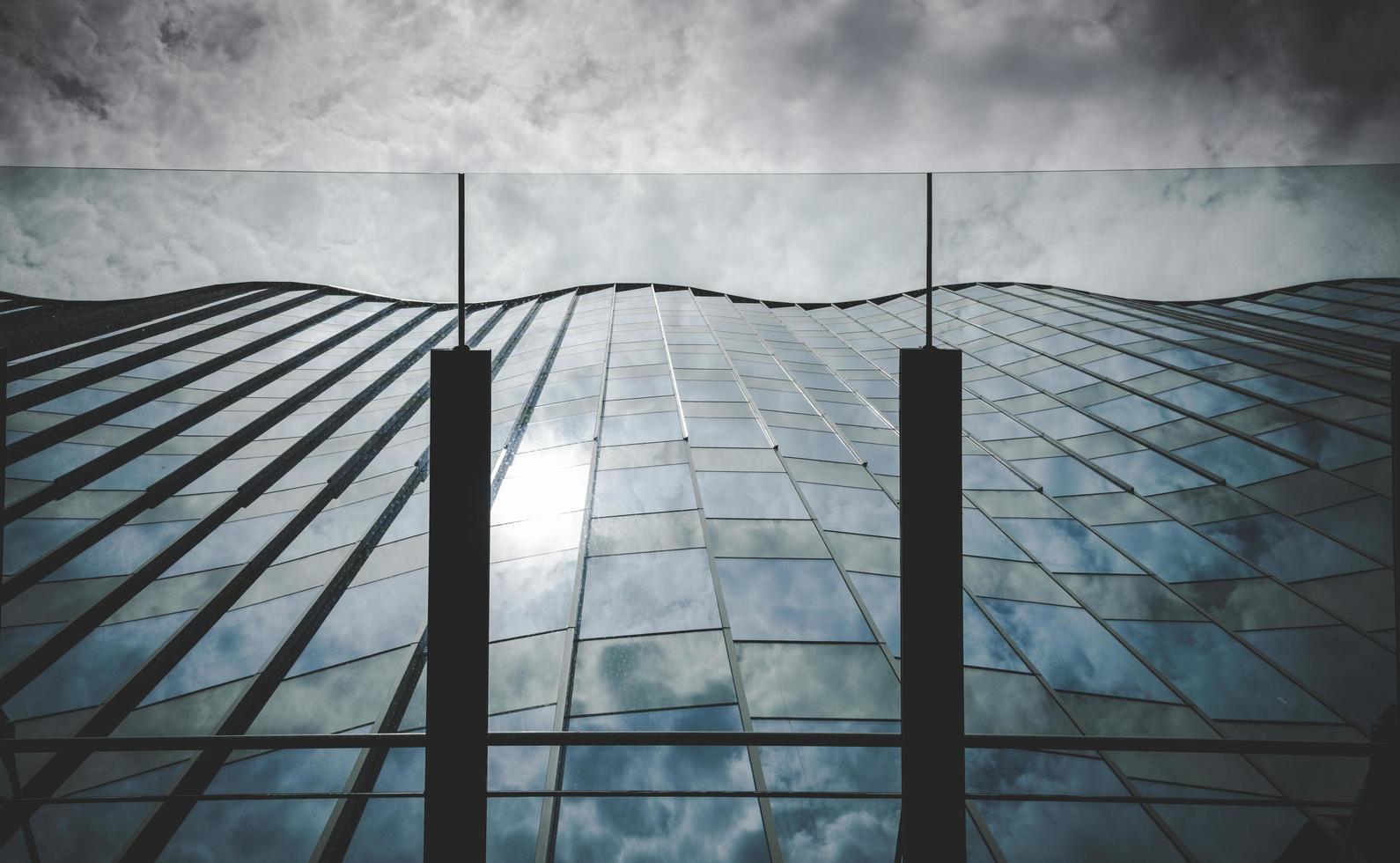 Modern architecture steel girders cladding the glass facade of business building photo