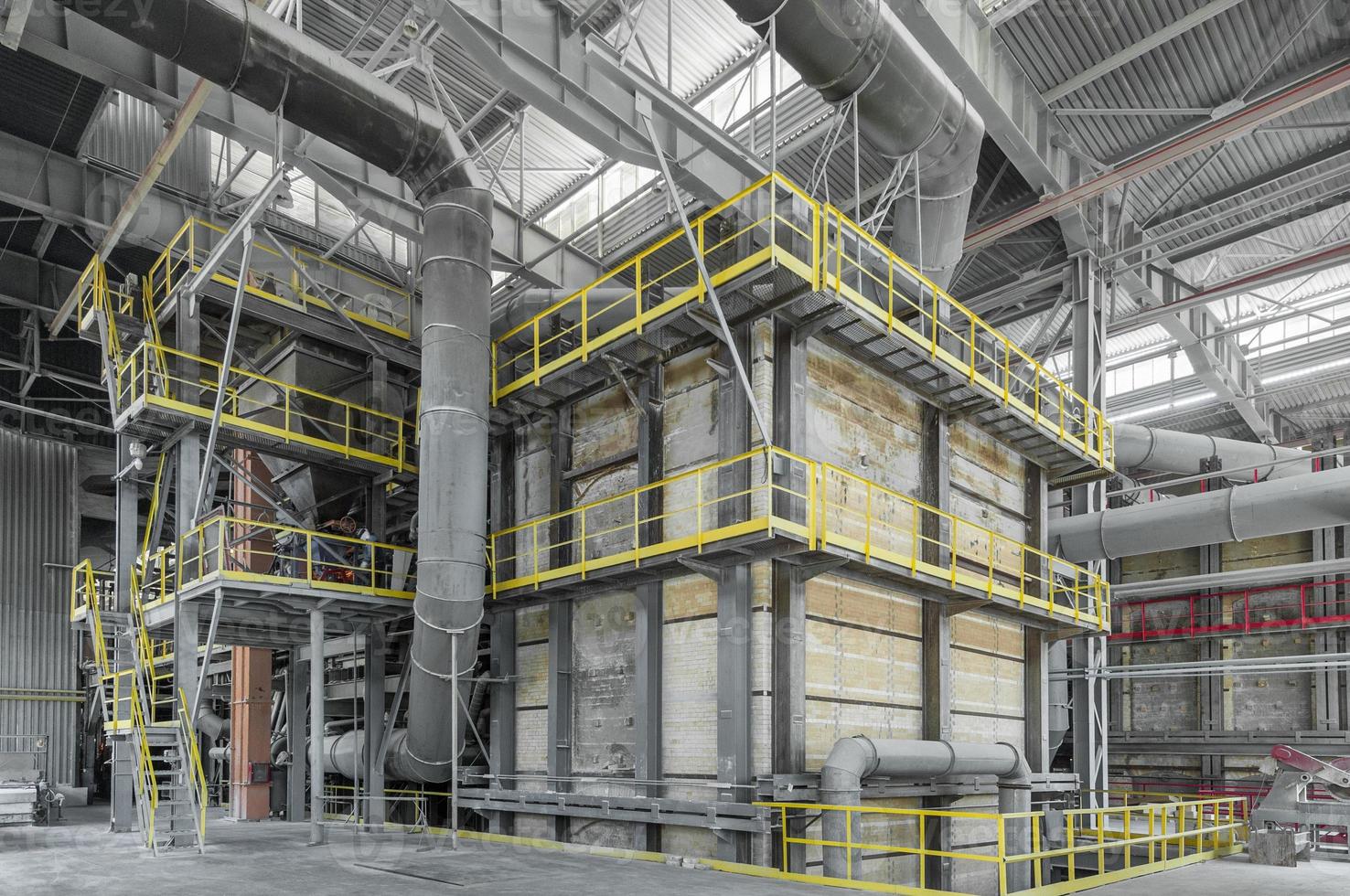 large closed industrial furnace in the manufacture of glass. heating the sand in a large closed oven for manufacture of glass photo