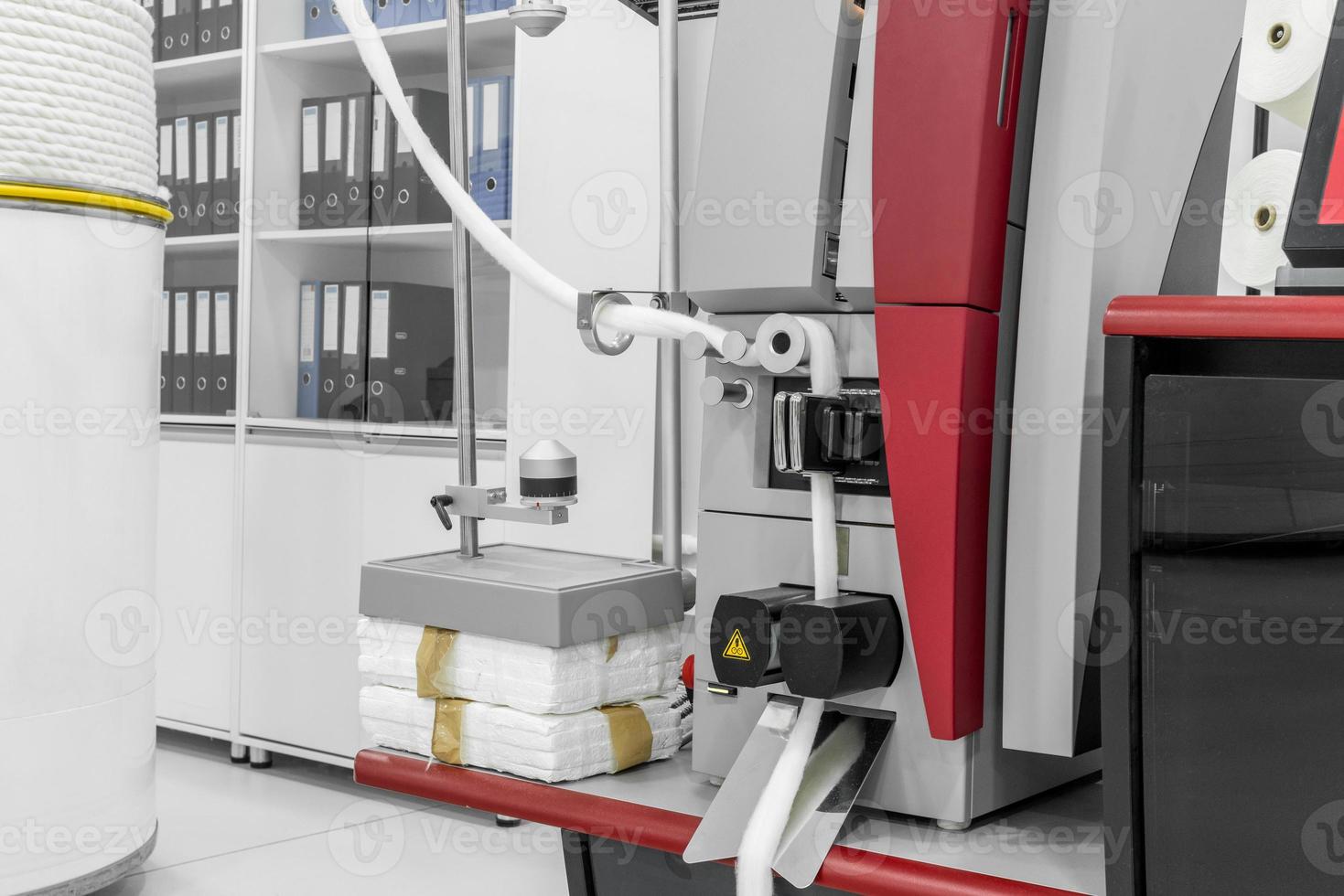 laboratory equipment checks the quality of cotton fiber in a textile factory photo