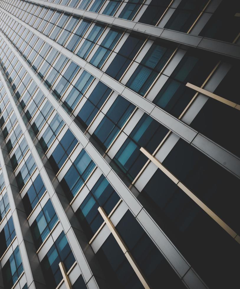 Modern architecture steel girders cladding the glass facade of business building photo