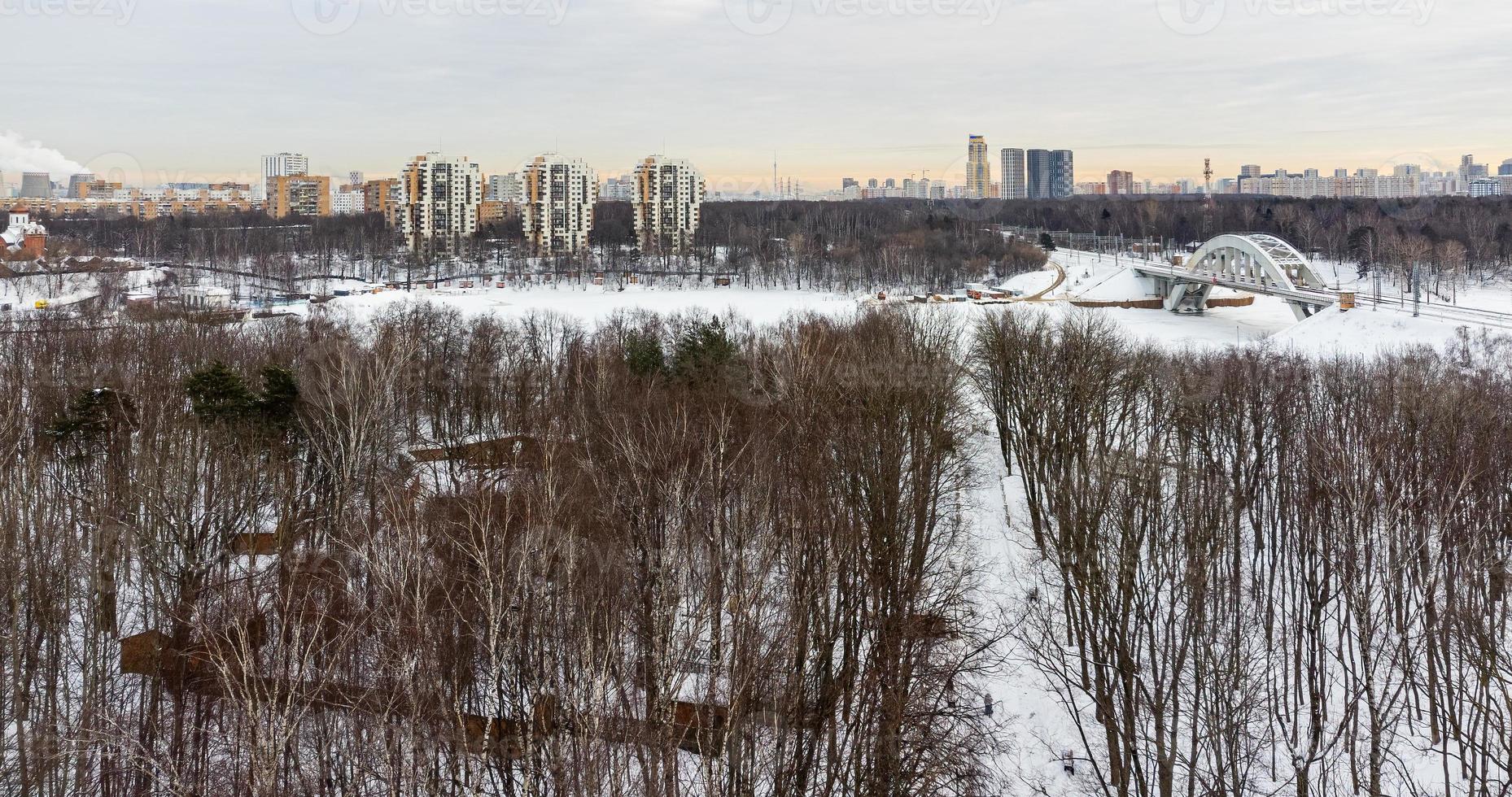 From the height there is a view of the park area and the path leading to the frozen river photo