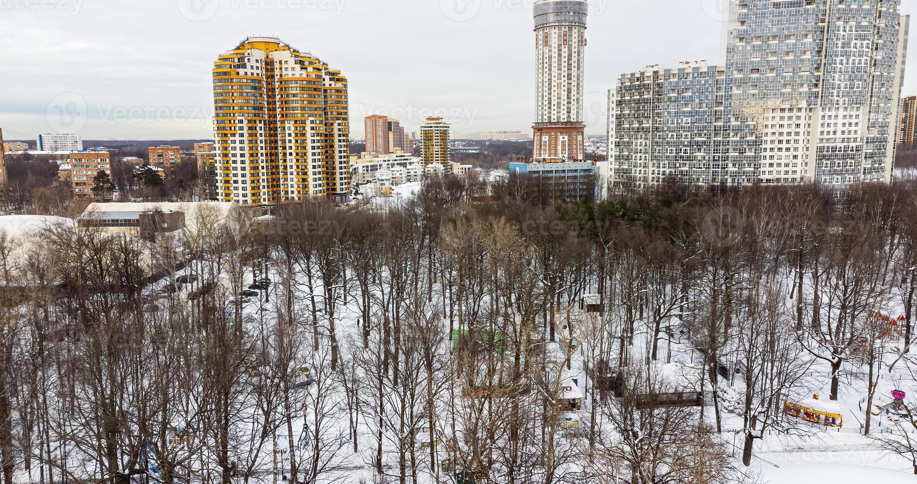 View of the residential complex from the park from a height in winter photo