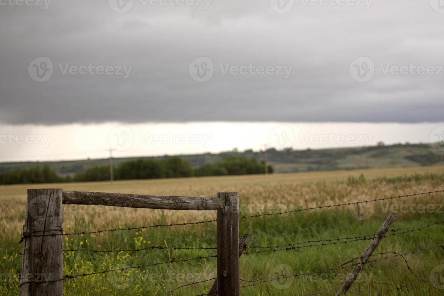 Storm Clouds Prairie Sky Fence photo