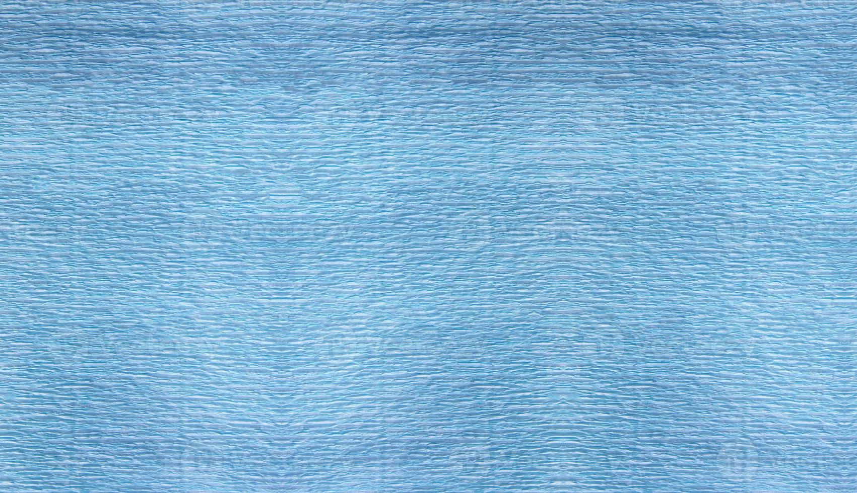 textura de papel corrupto en azul foto