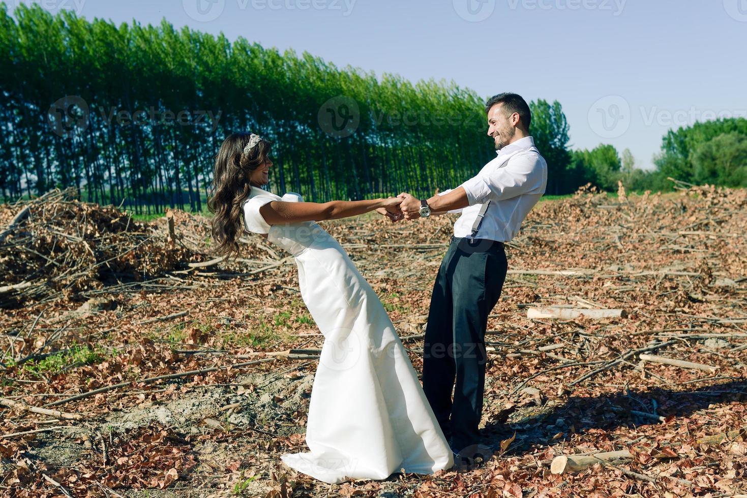 Just married couple in poplar background photo