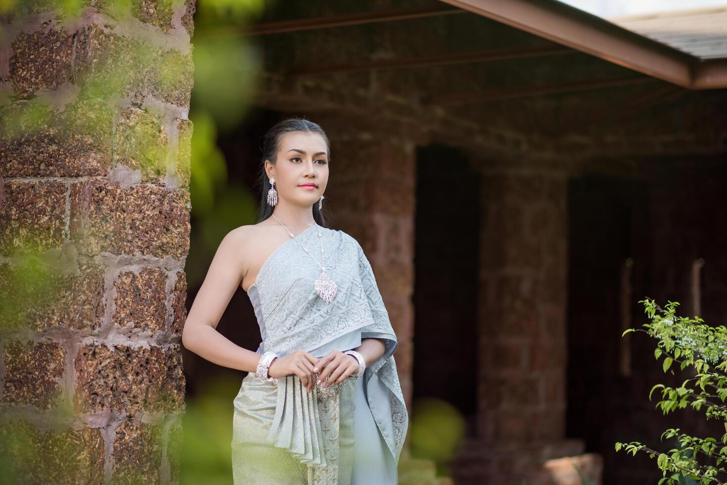 Beautiful Woman wearing typical Thai dress photo