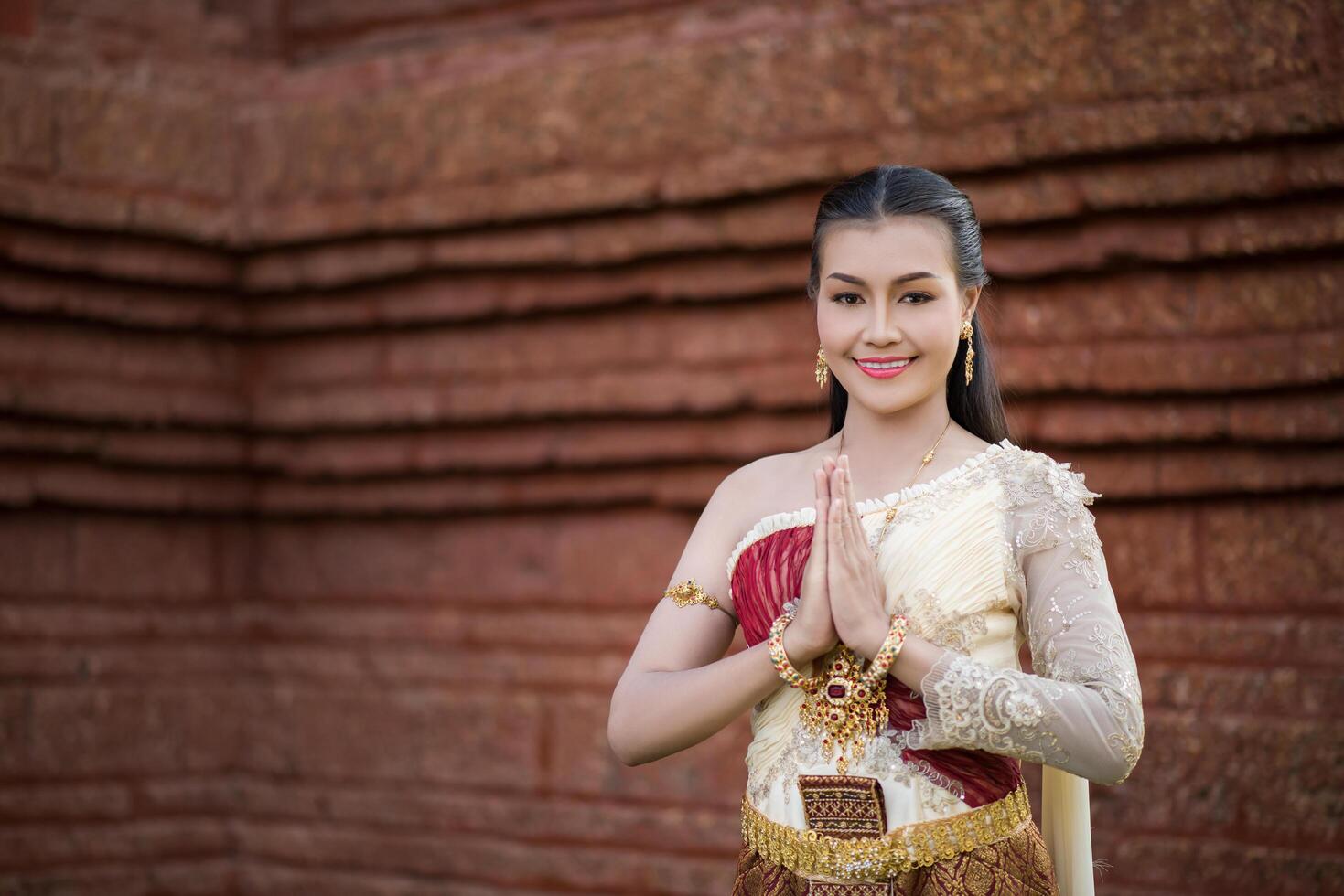 Beautiful Woman wearing typical Thai dress photo