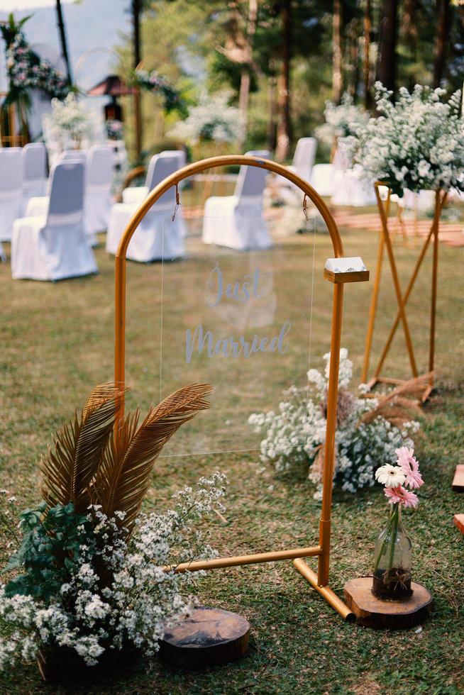 Wedding arch, wedding, wedding moment, wedding decorations, flowers, chairs, outdoor ceremony in the open air photo