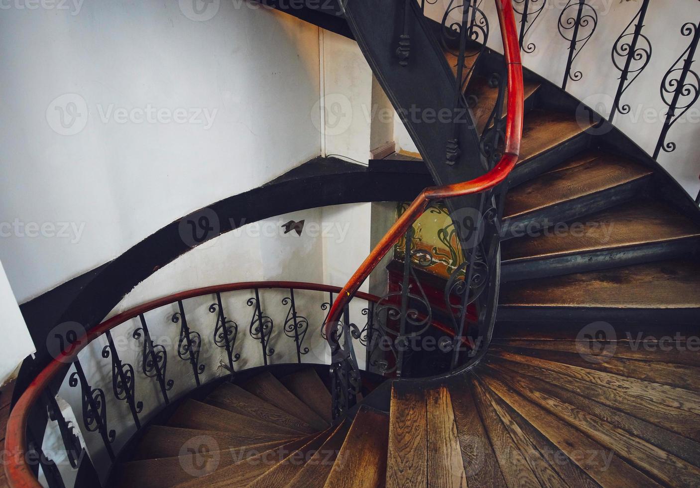 Antique vintage rounded staircase in old house, Strasbourg, France photo