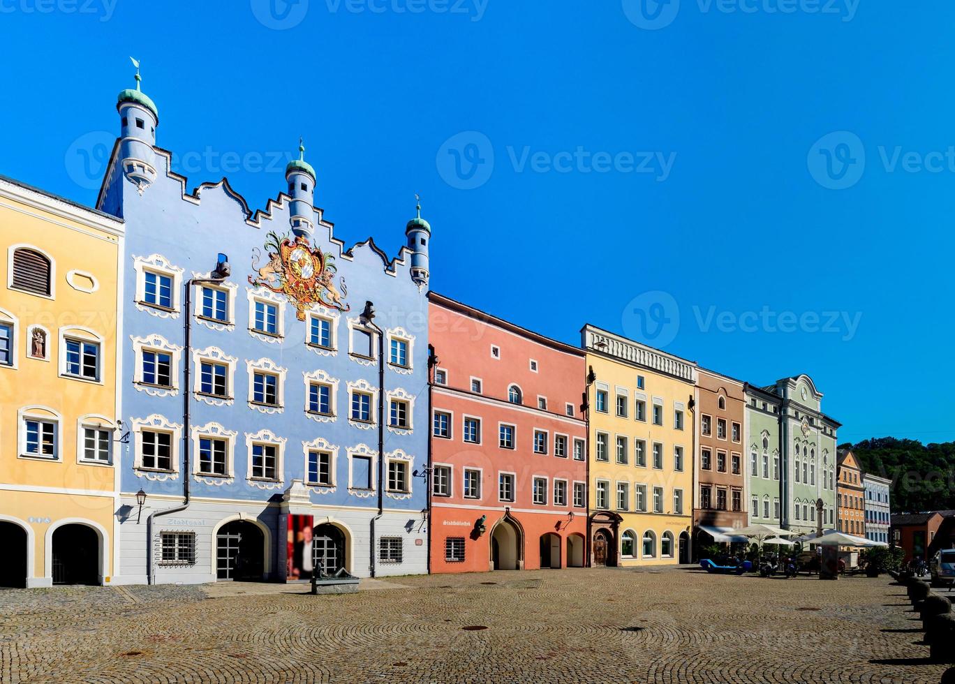 The central square of the town of Burghausen Germany. Sunny day. Amazing colorful houses. photo