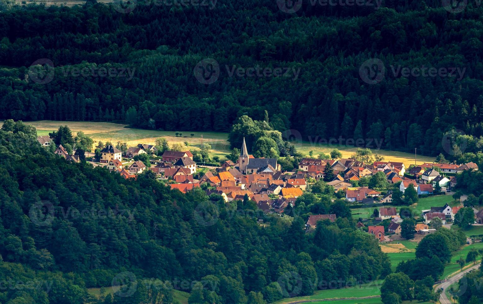 Spacious mountain landscape. A view from the mountain to the valley of Rhine and the village of Alsace. photo