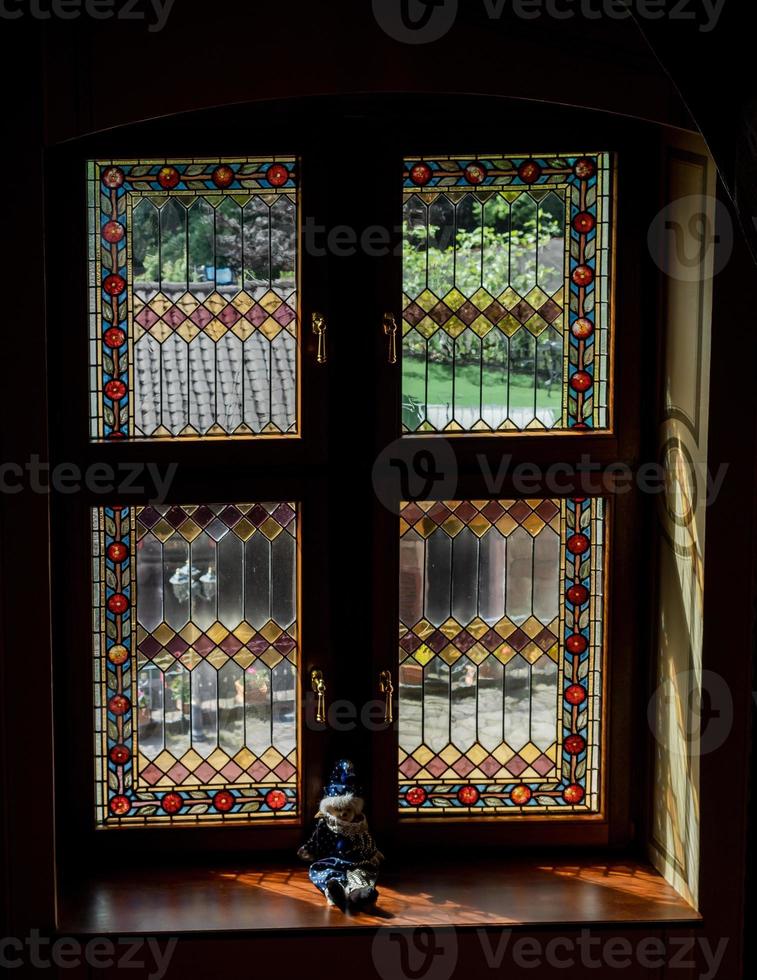 Beautiful stained glass windows through which the sun shines. photo