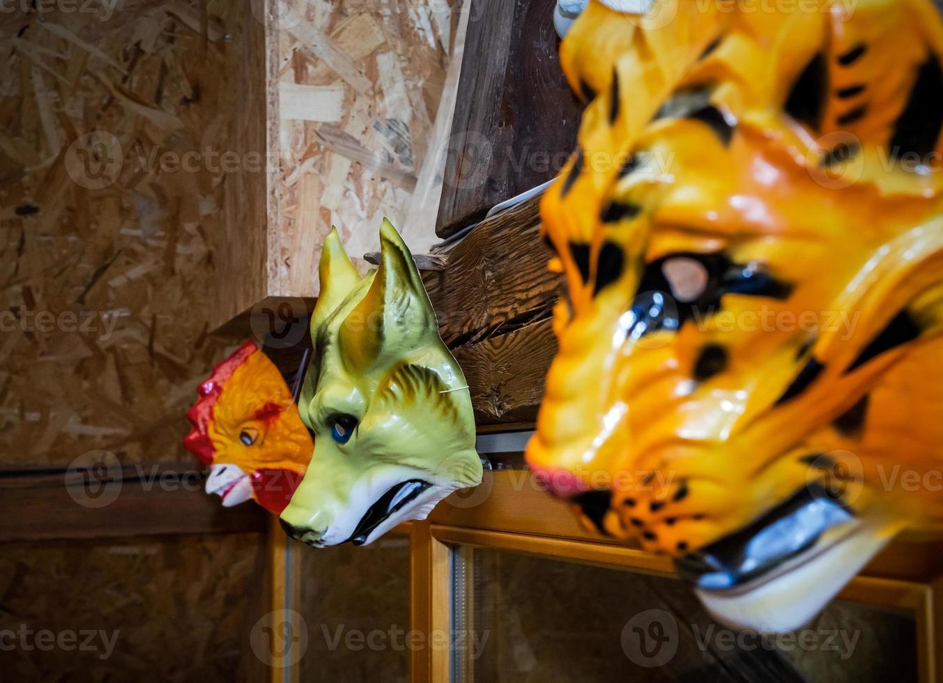 Masquerade masks on the wall photo