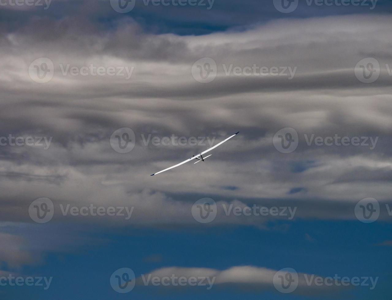 RC model of an airplane in the sky. Recreation and entertainment for children photo