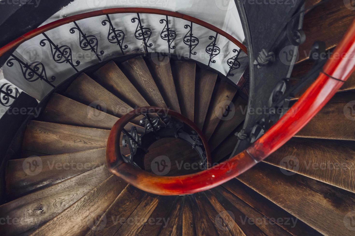 Antique vintage rounded staircase in old house, Strasbourg, France photo