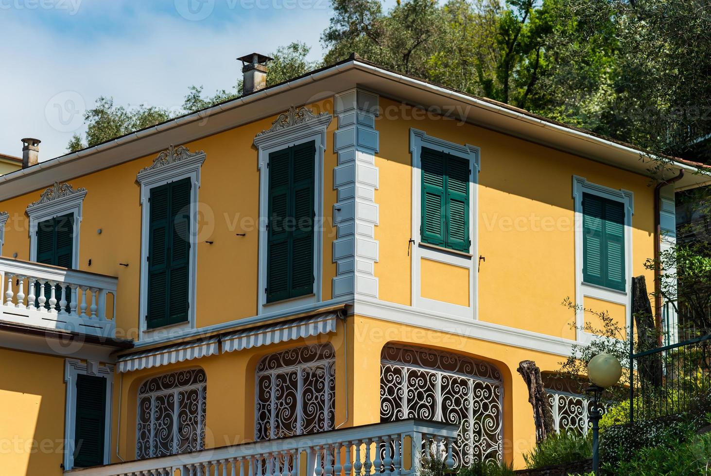 Bright and colorful Italian cityscape. Sunlit streets. Colorful houses. Warm and comfortable. photo