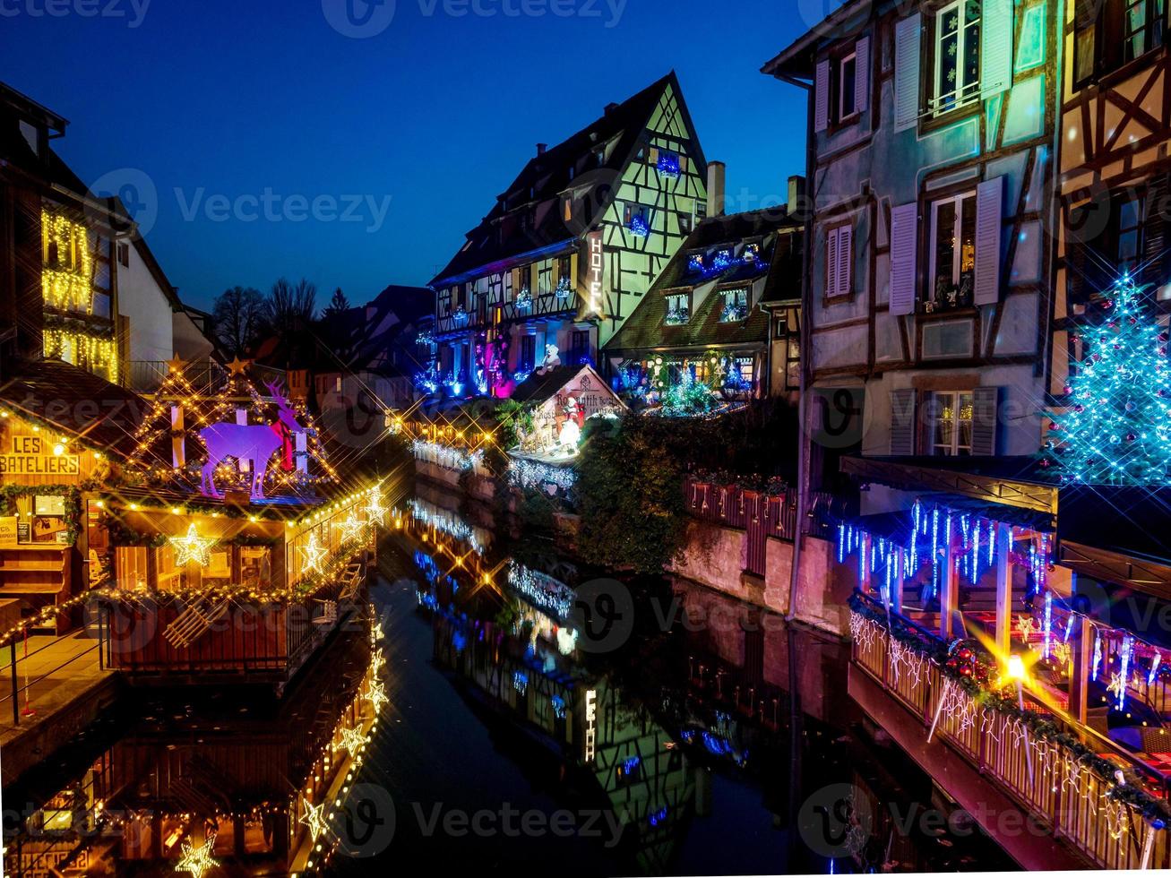 Christmas decorations on the streets of Colmar. Illuminated houses and New Year's fairy tale photo