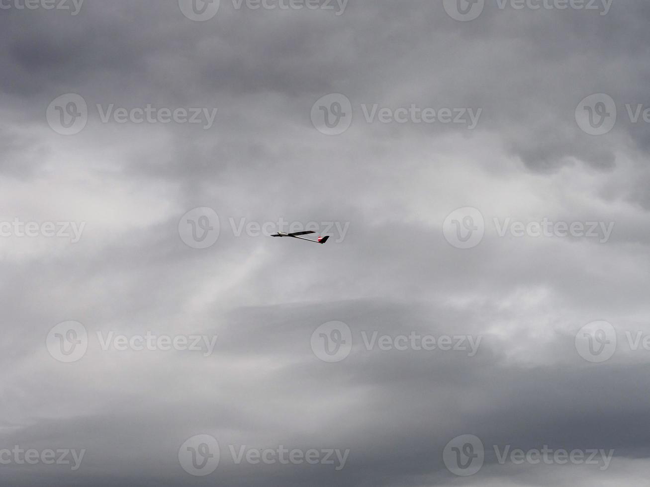 RC model of an airplane in the sky. Recreation and entertainment for children photo