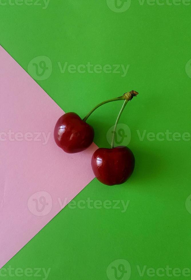 Sweet cherry backgroung on the table photo