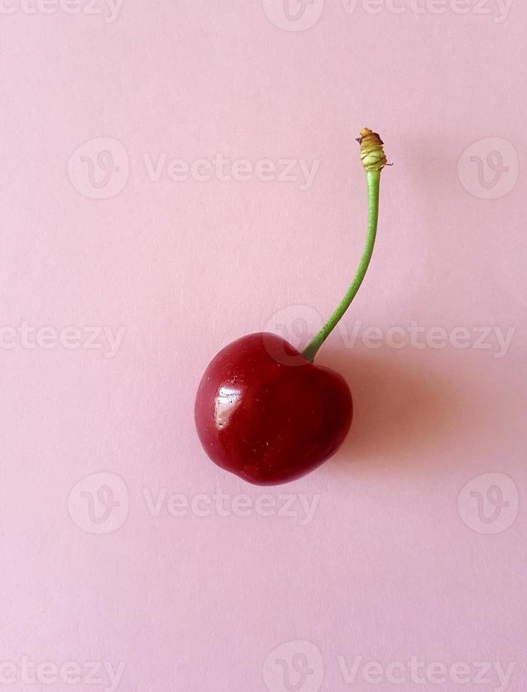 Sweet cherry backgroung on the table photo