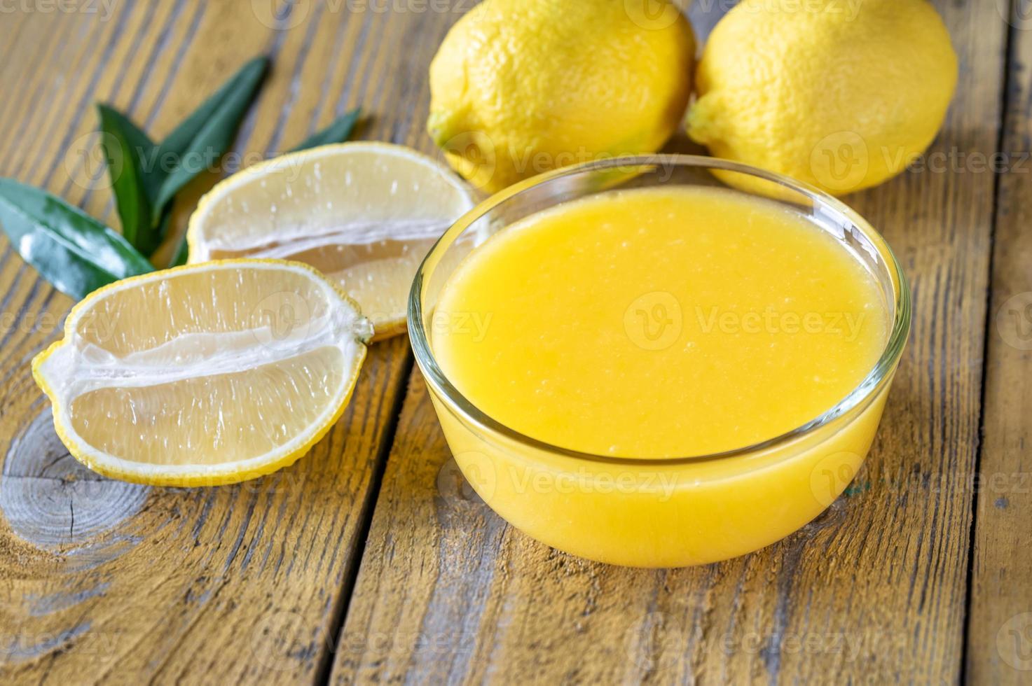 Glass bowl of lemon curd photo