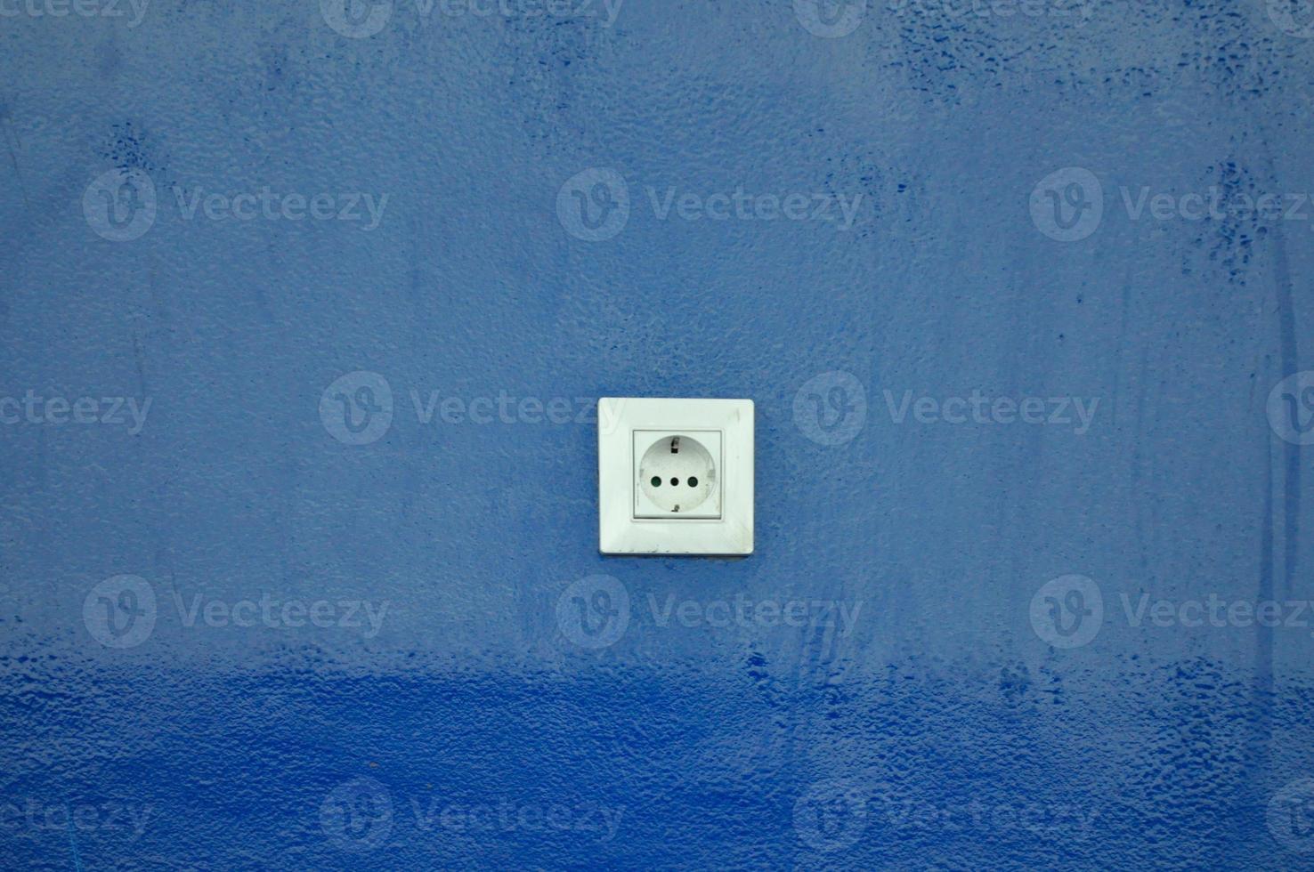 Schuko socket in wall photo