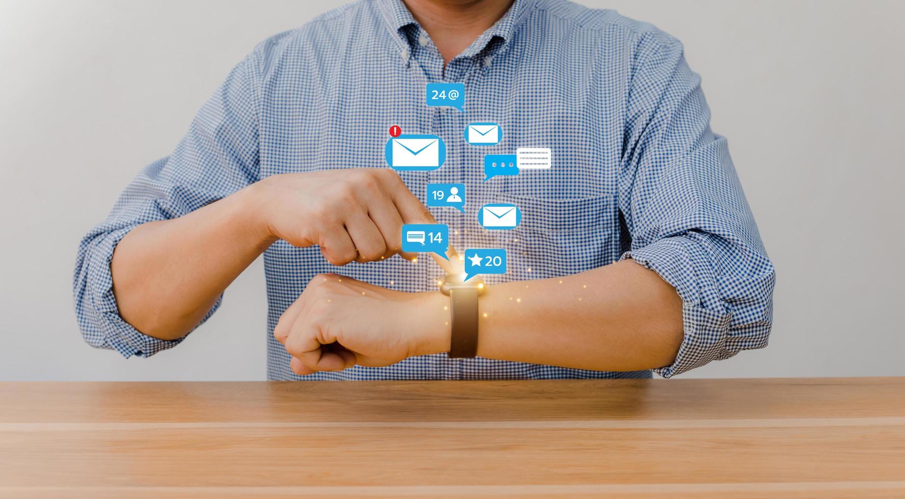 People using social media marketing ideas on smart watches. with notification icons like, messages, comments and stars photo